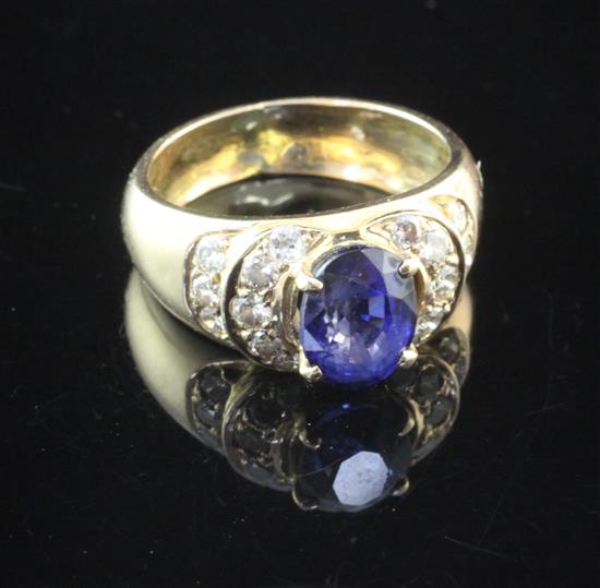 A gold, sapphire and diamond set dress ring, size K.